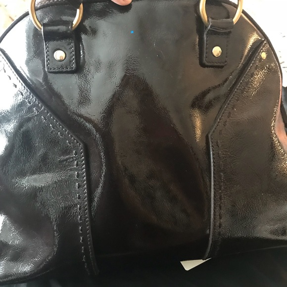 Yves Saint Laurent - Picture 8 of 13